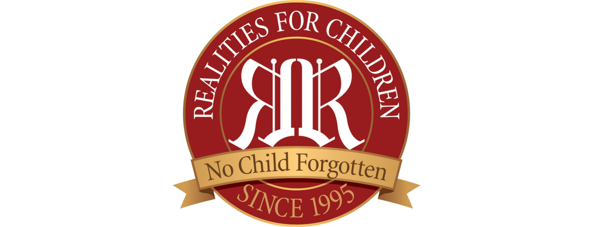 A round red and gold logo that reads "Realities For Children" around the top, with a ribbon stating "No Child Forgotten" and "Since 1995" along the bottom. White stylized letters are in the center.